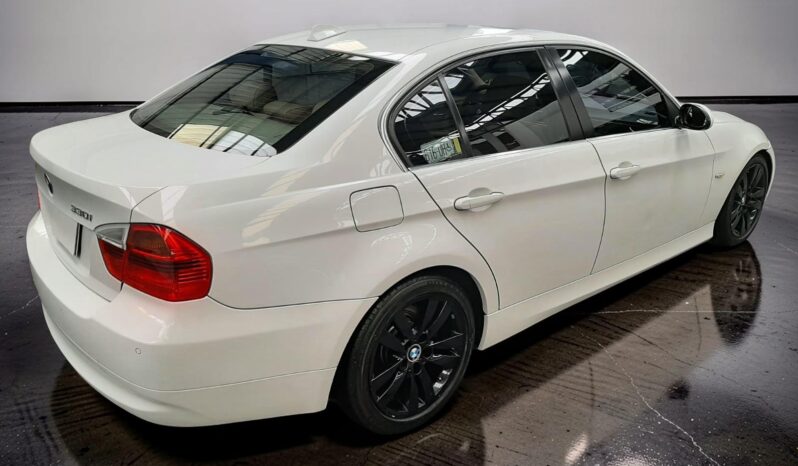 BMW 330i 2006 lleno