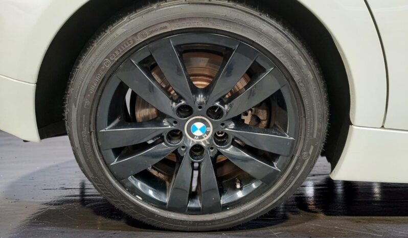 BMW 330i 2006 lleno
