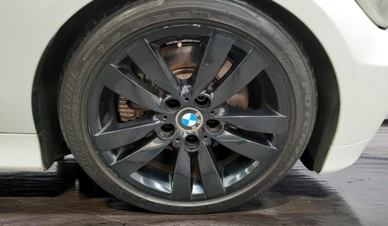 BMW 330i 2006 lleno